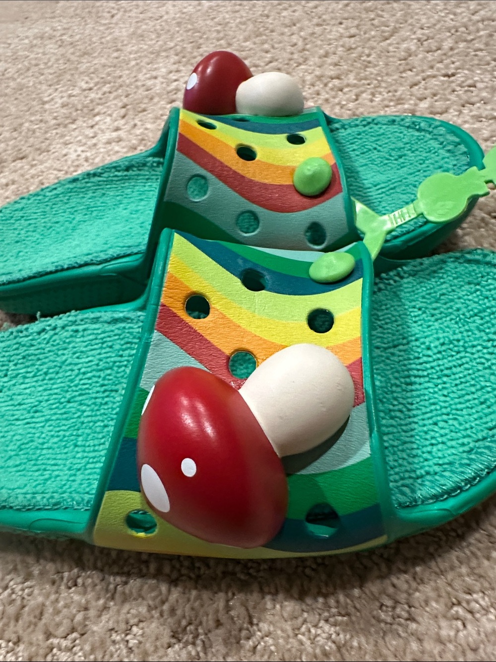CROCS Teal Slide Sandals with Rainbow Straps and Red Mushroom Charms - Picture 5 of 6